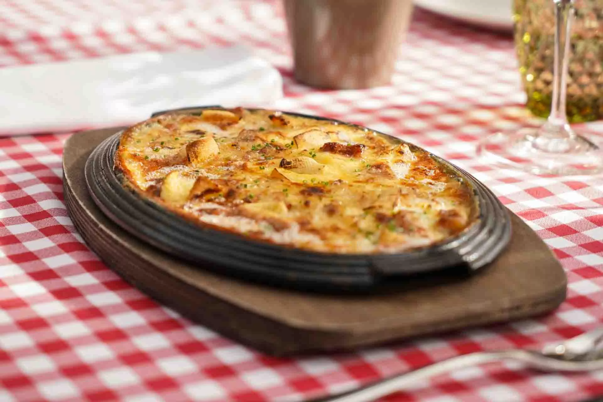 La tartiflette de El Chalet El Palace en Barcelona / ÒSCAR GIL COY